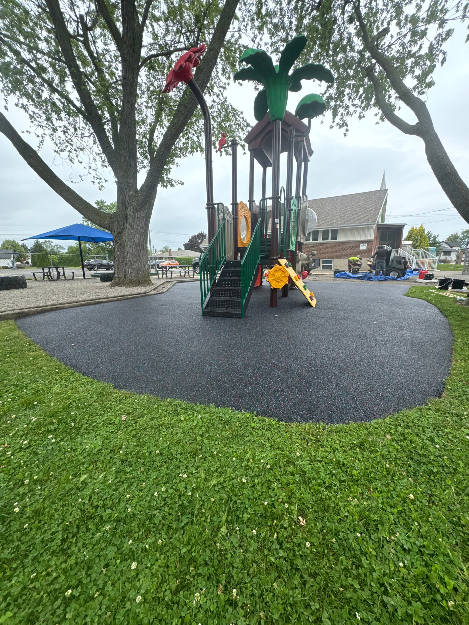 Recycled rubber surfacing on a playground