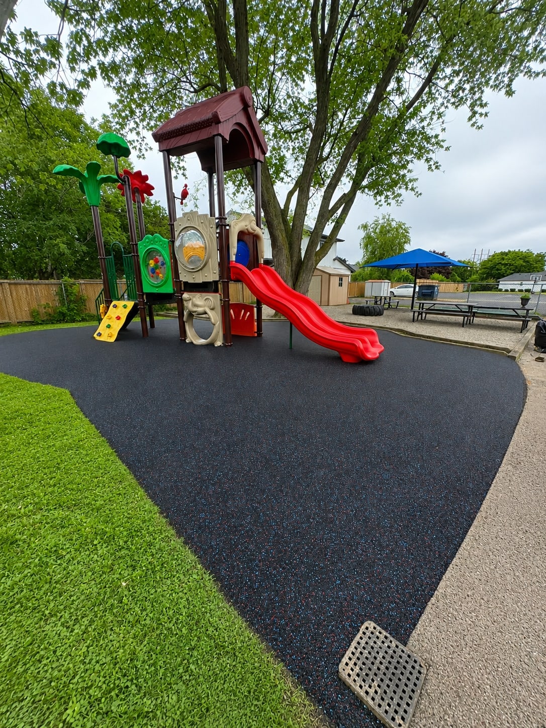 Simple daycare playground with rubber surfacing