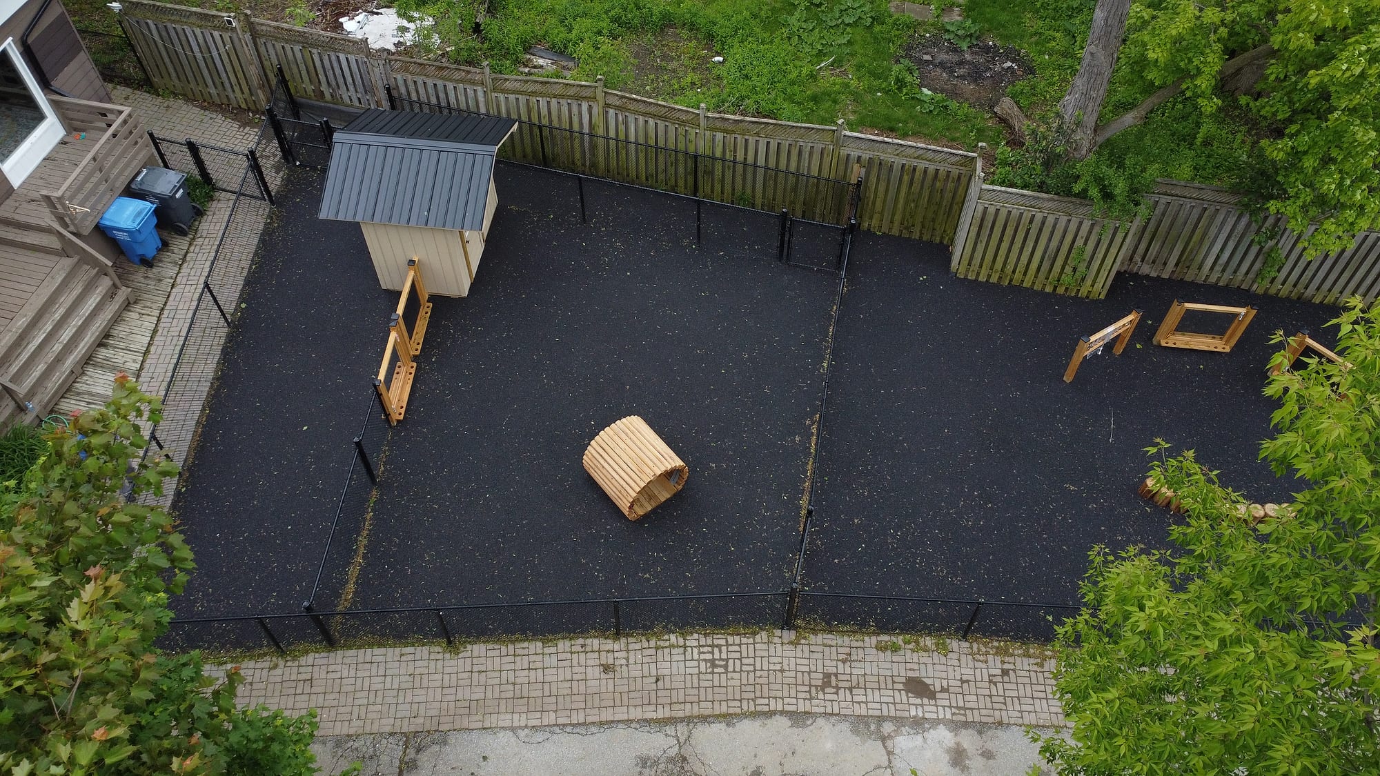 aerial natural playground rubber surface log tunnel