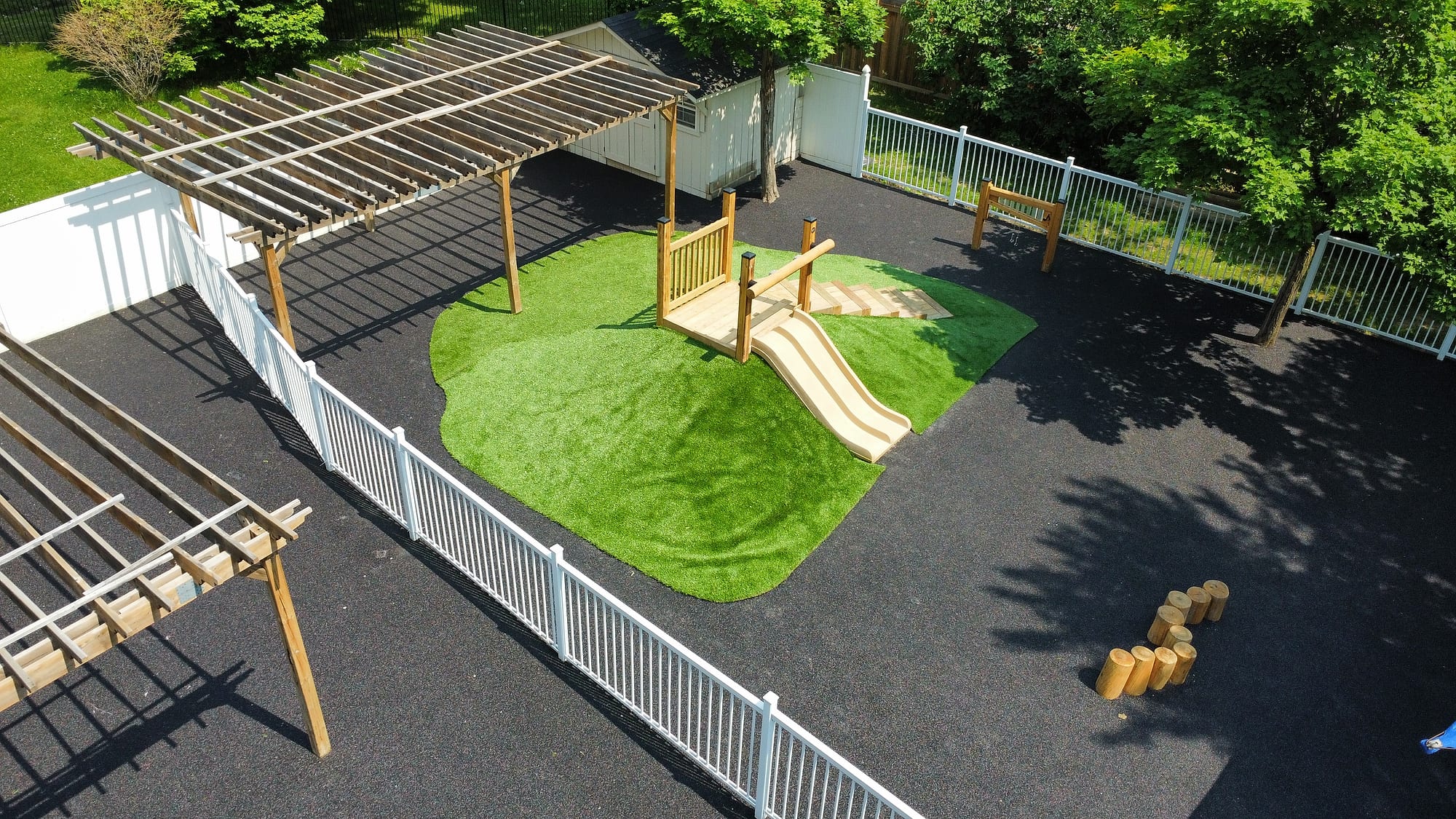 daycare outdoor play space turf rubber surfacing aerial