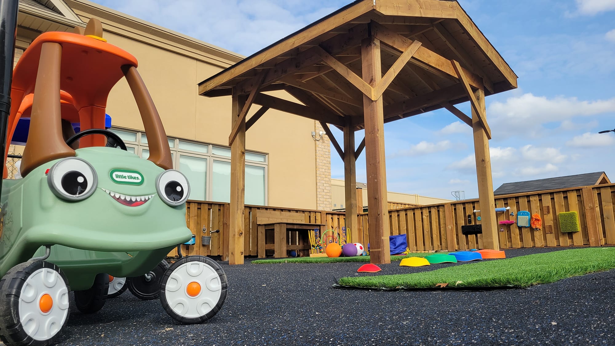 daycare playground ride on car rubber surfacing