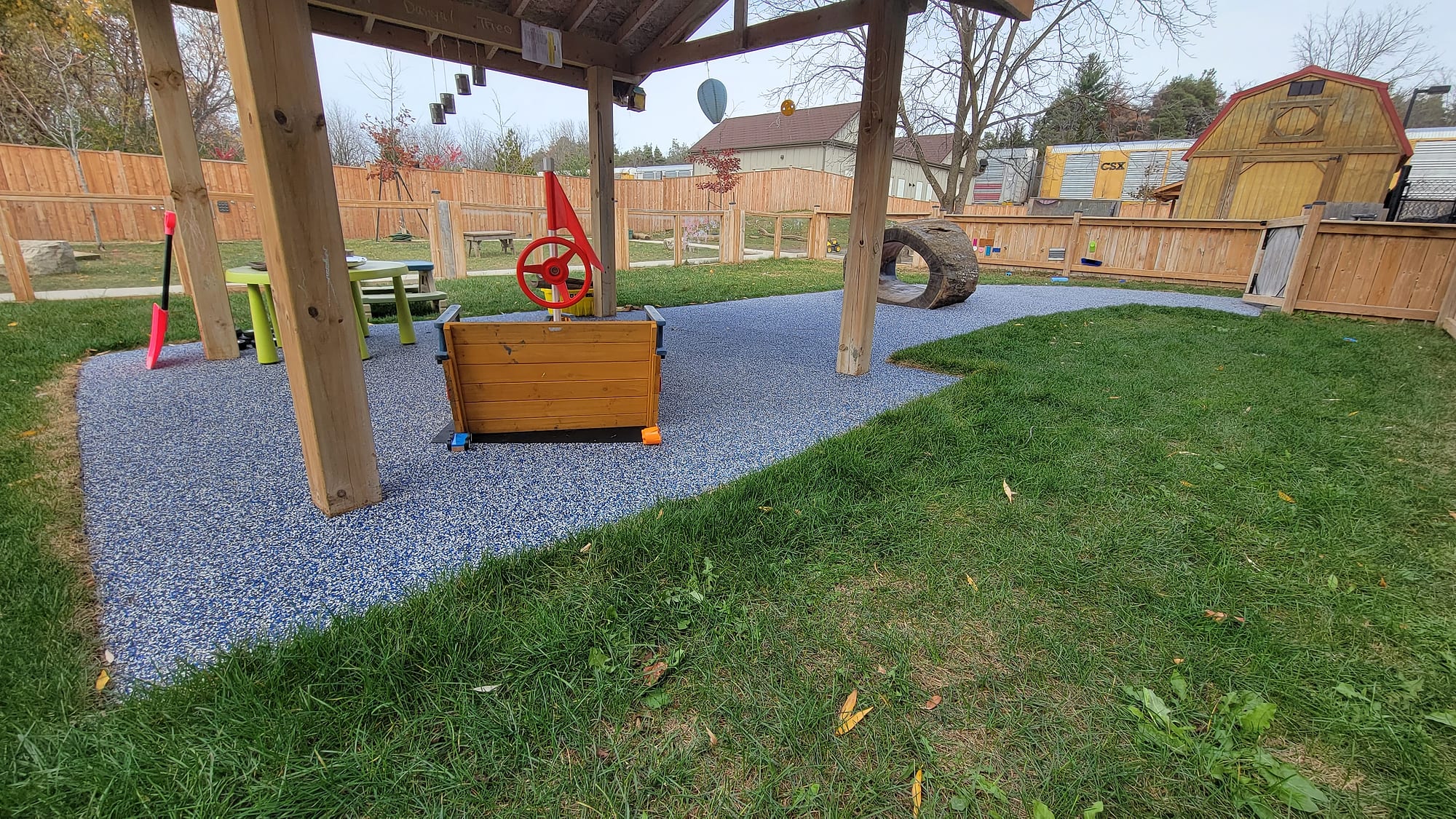 daycare playground rubber surfacing covered play area