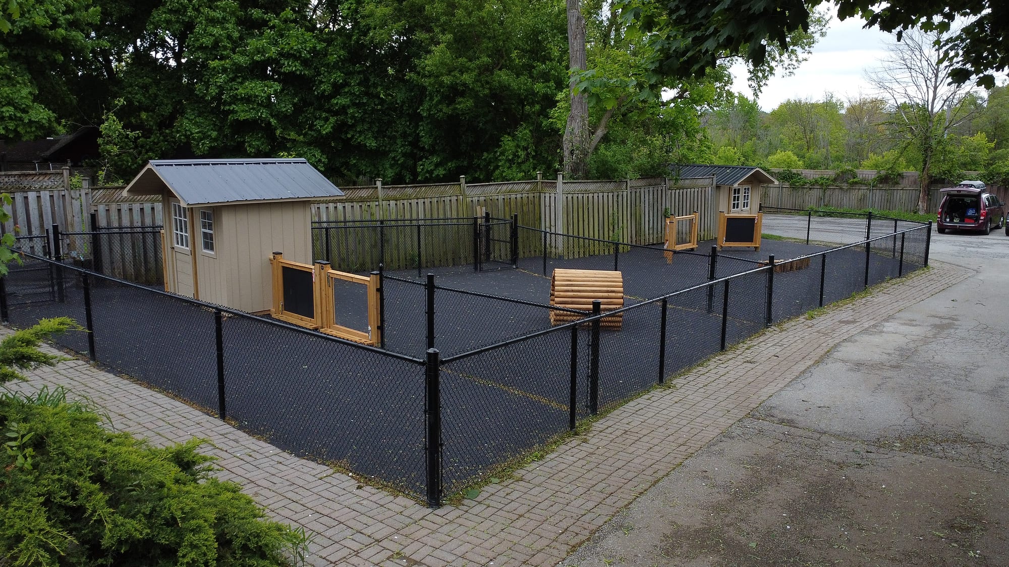 fenced daycare playground rubber surfacing aerial