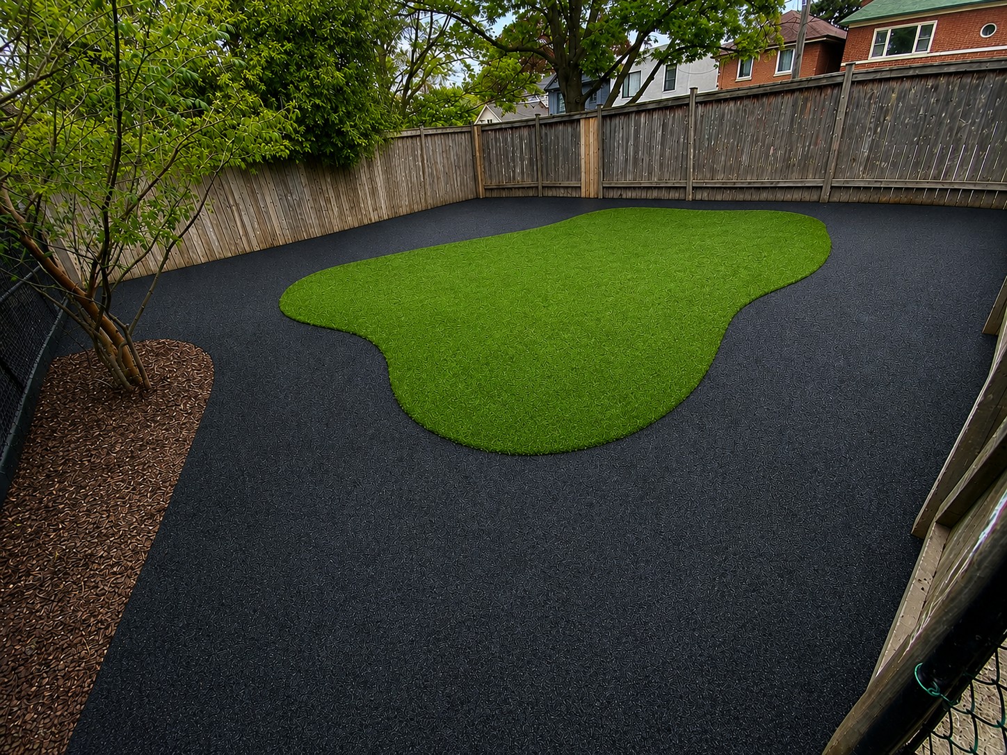 Finished daycare playground rubber surfacing with artificial turf