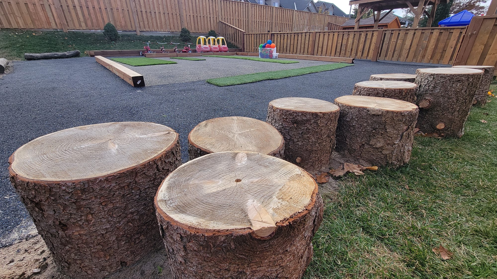 natural log stumps playground rubber surfacing