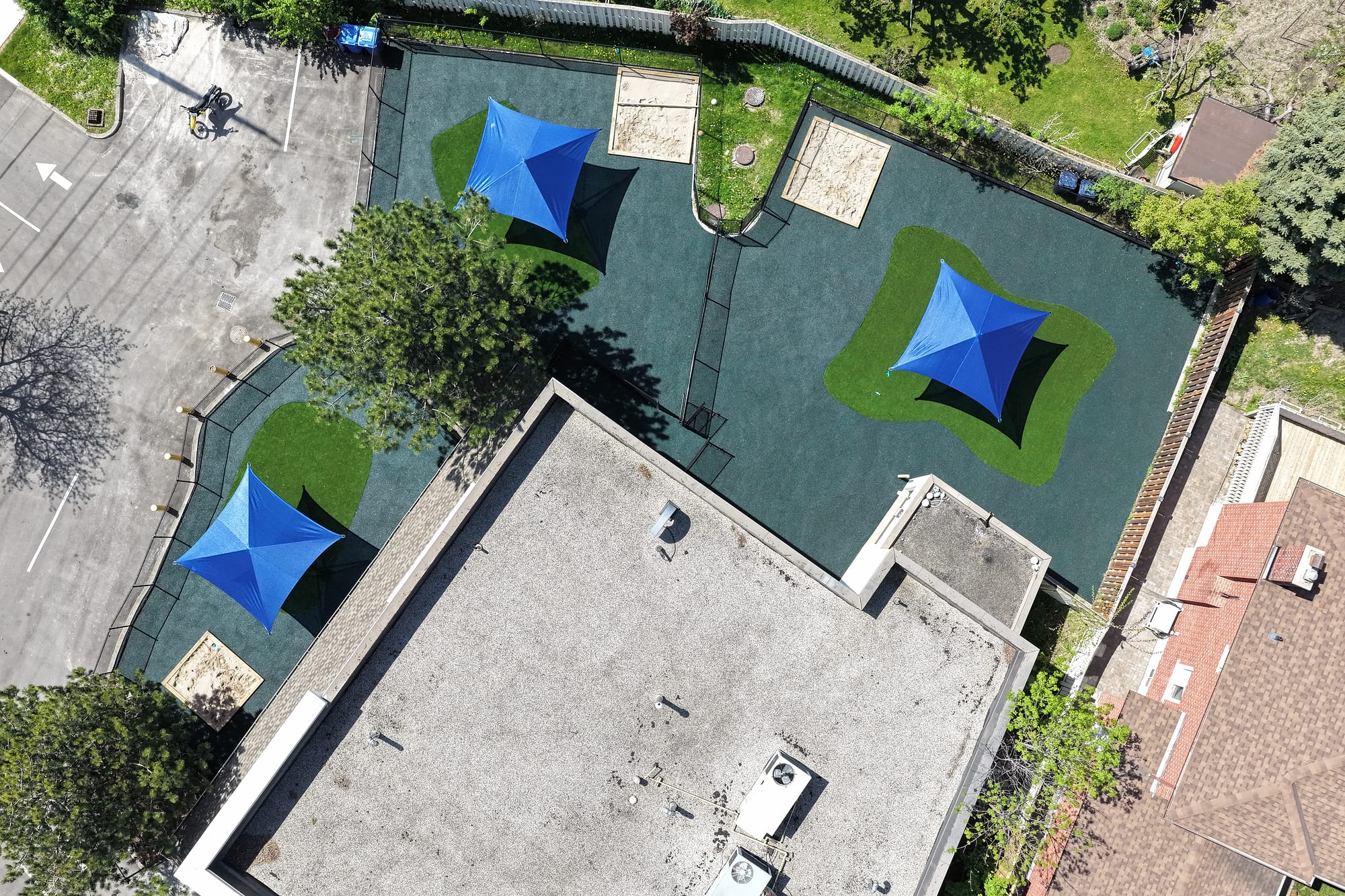 overhead play yard shade sails rubber surfacing