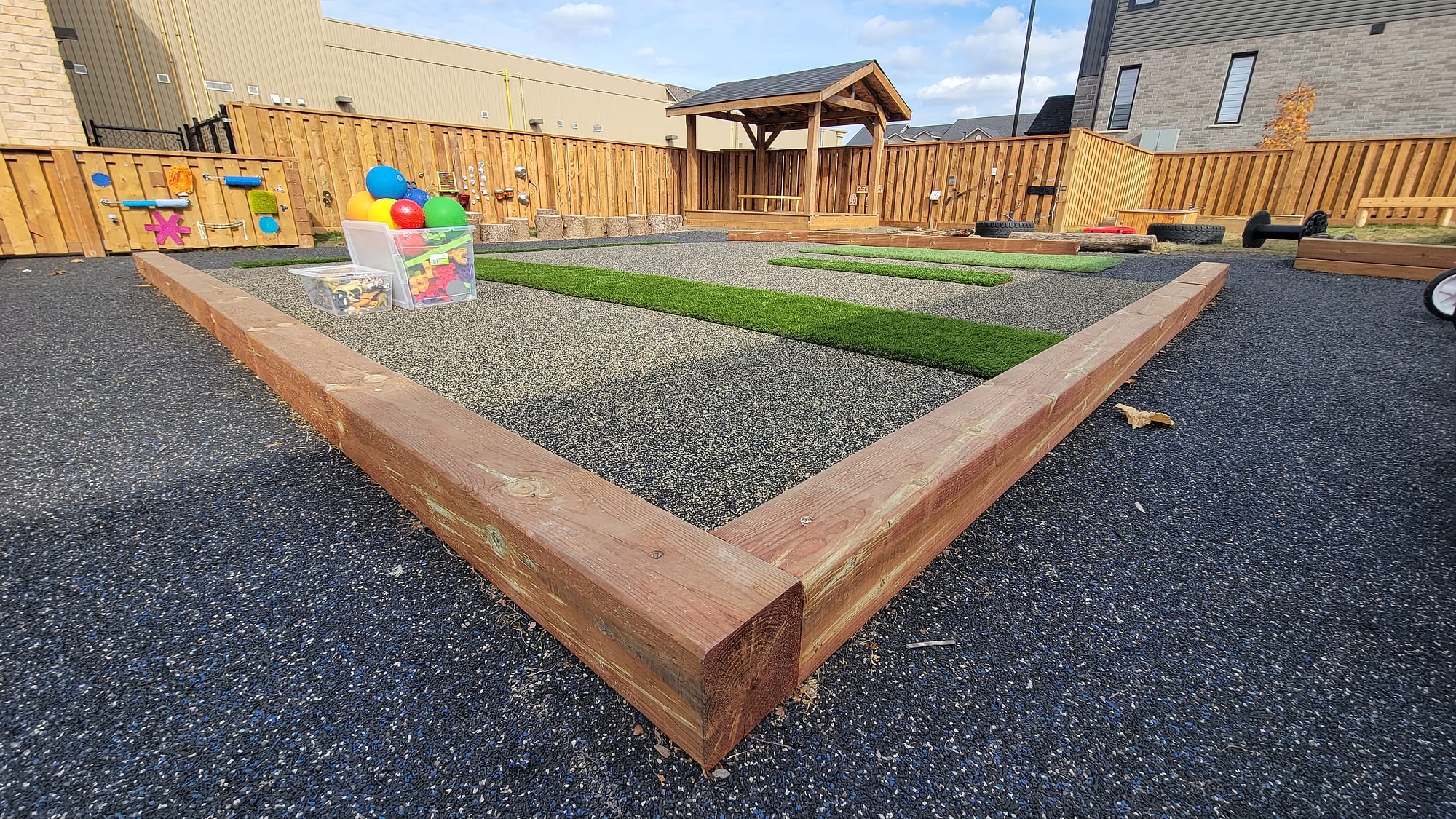 raised play space daycare rubber surfacing