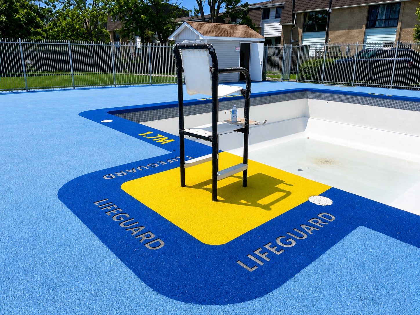 Campground pool deck with custom logos