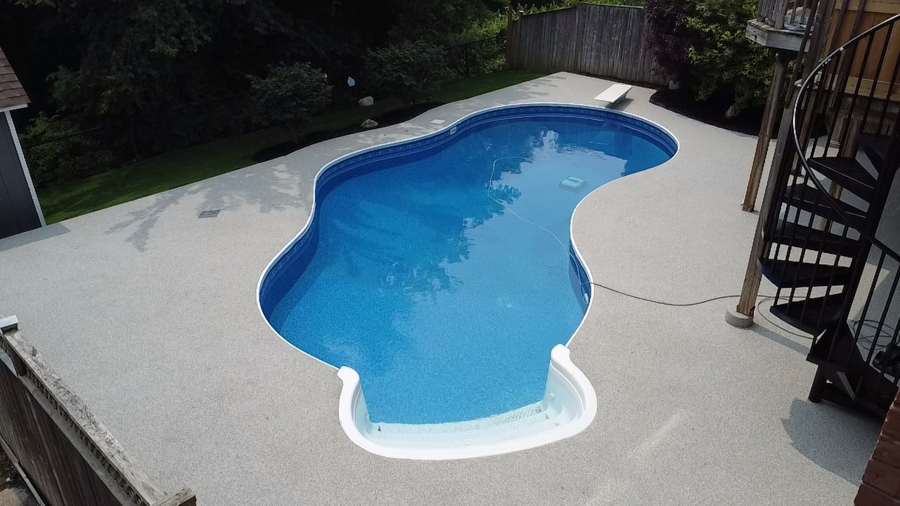 Rubberscape backyard pool deck