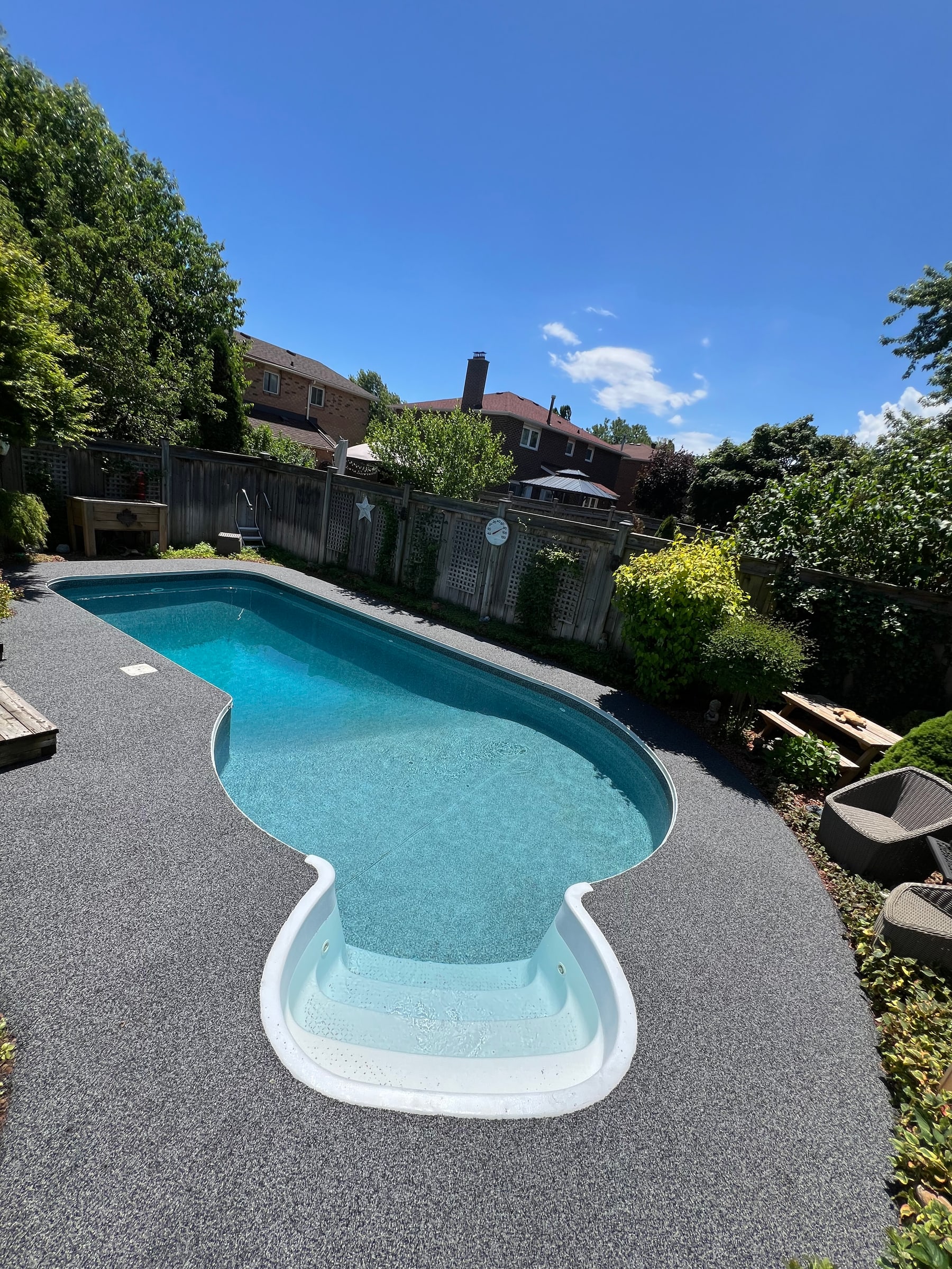 Clean rubber pool deck backyard
