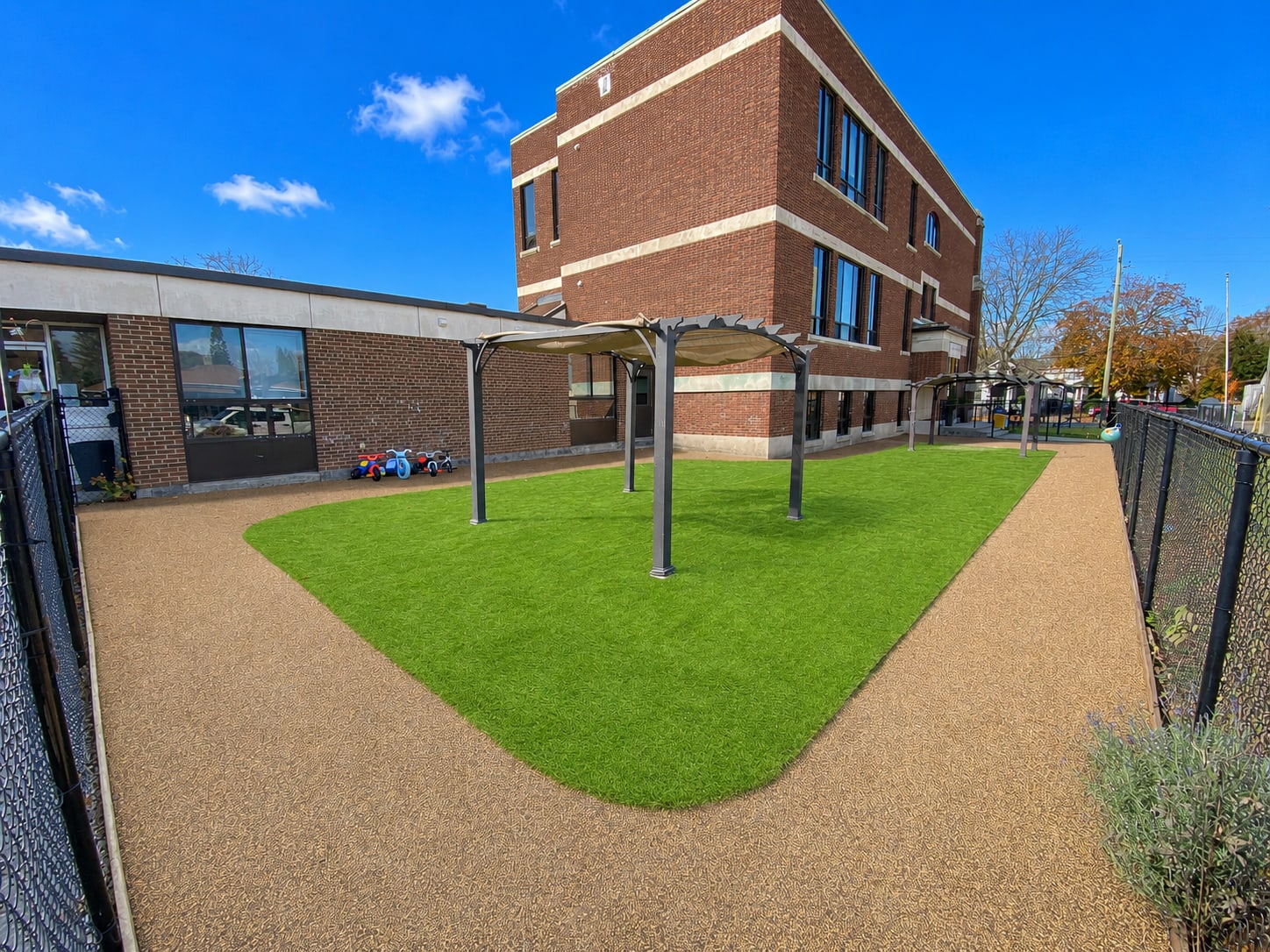 Daycare artificial turf with rubber track