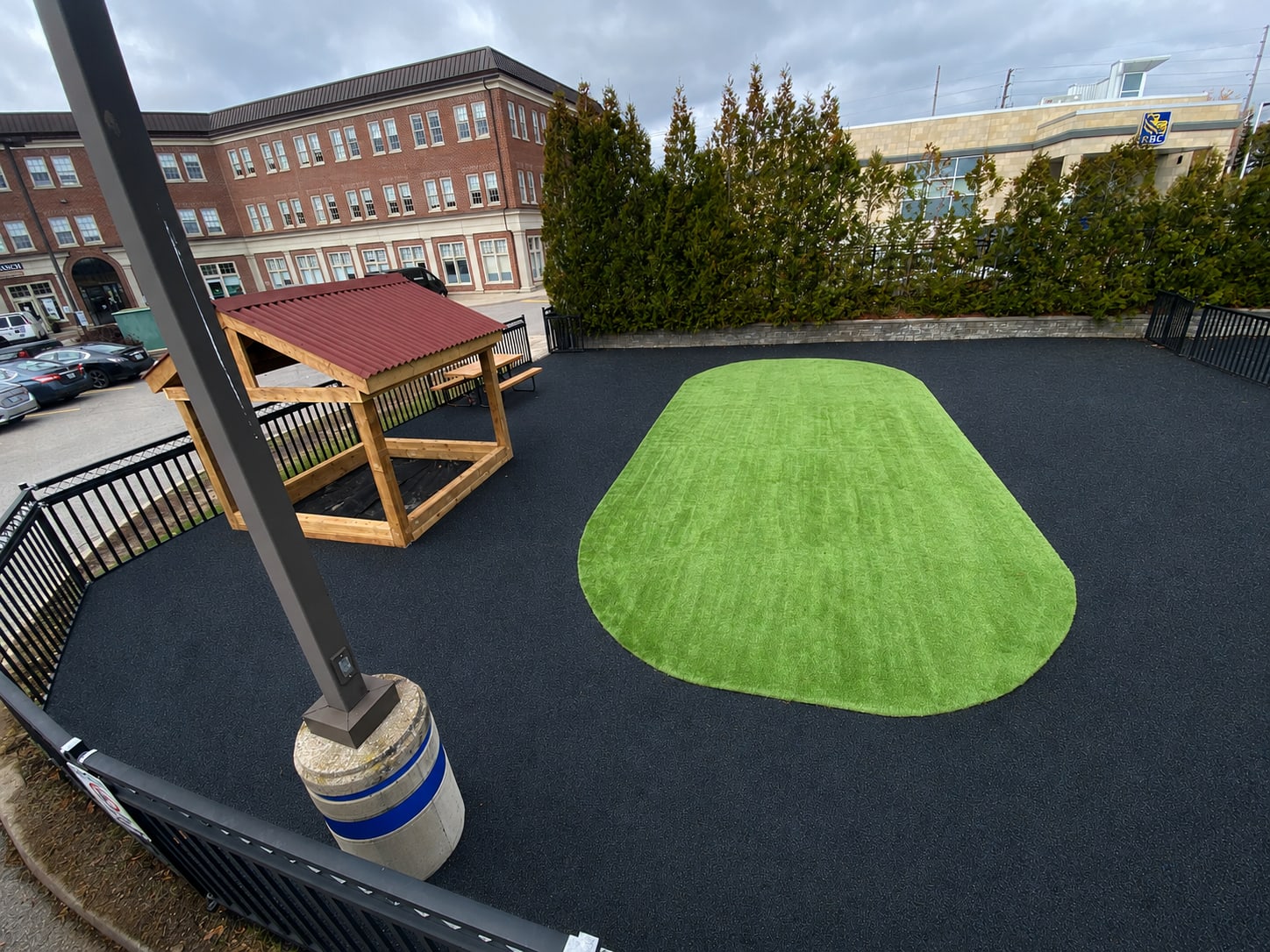 Turf pad with rubber surfacing