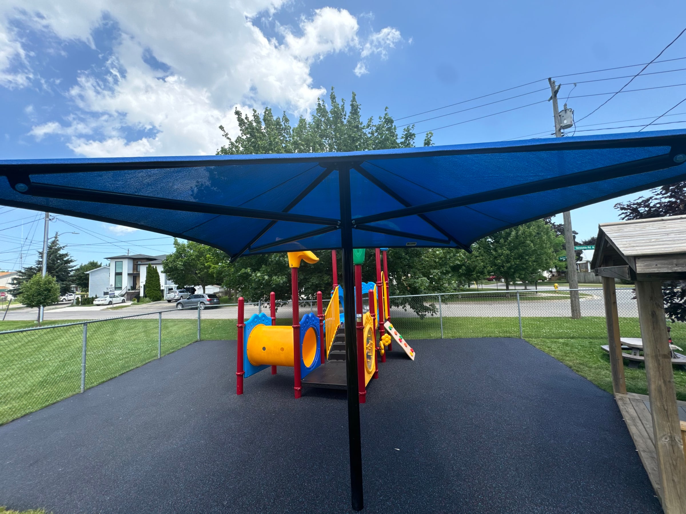 Blue shade structure with rubber surfacing