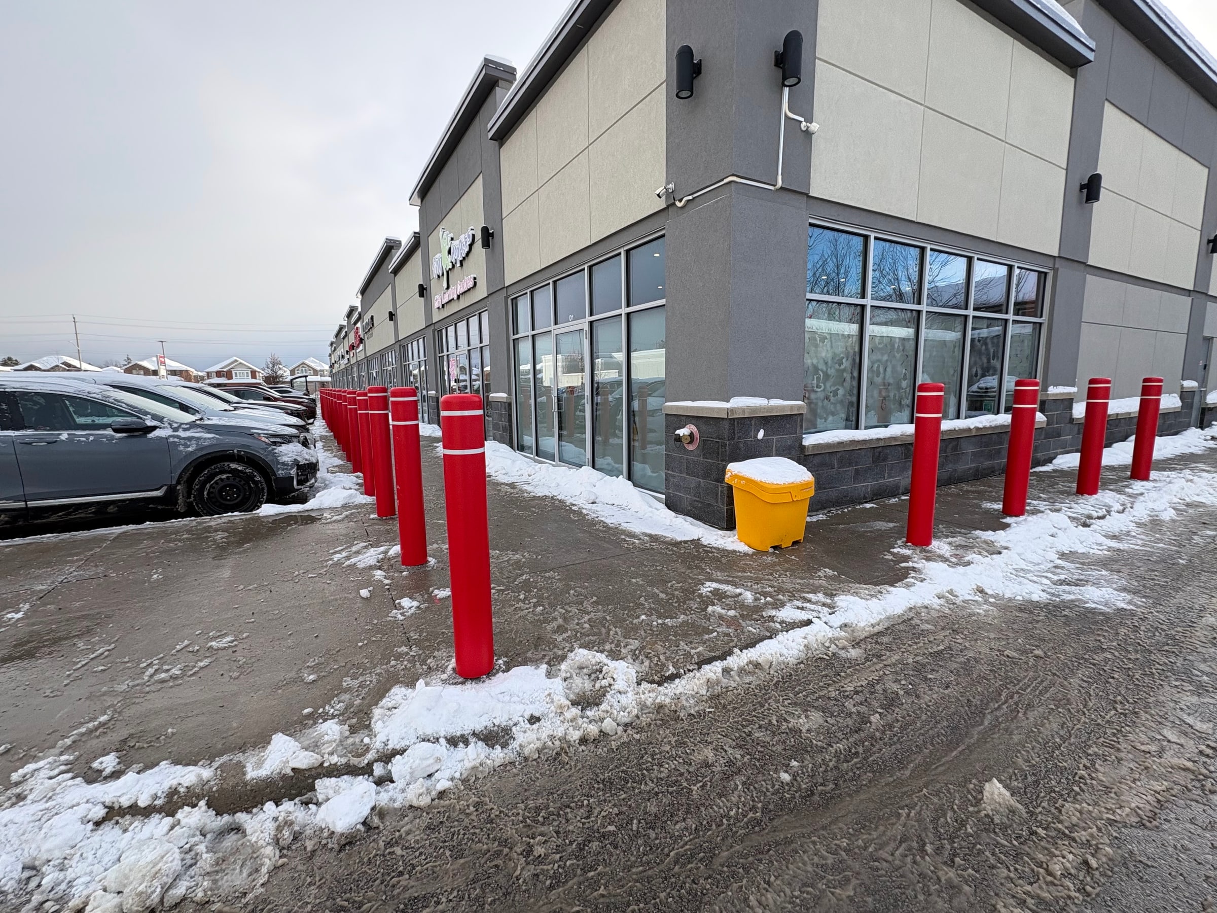 Red safety bollards by Rubberscape
