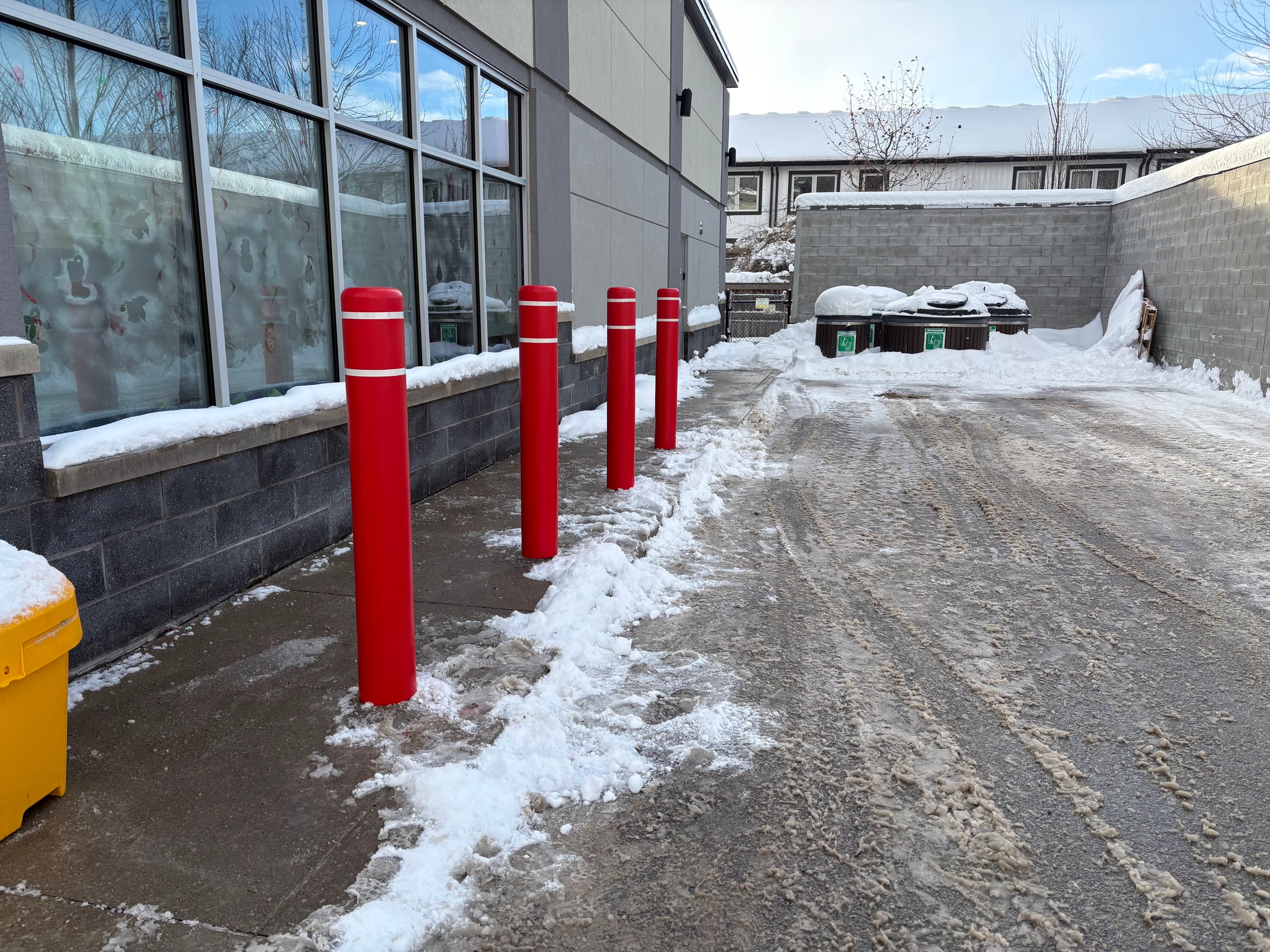 Safety bollards for loading zones