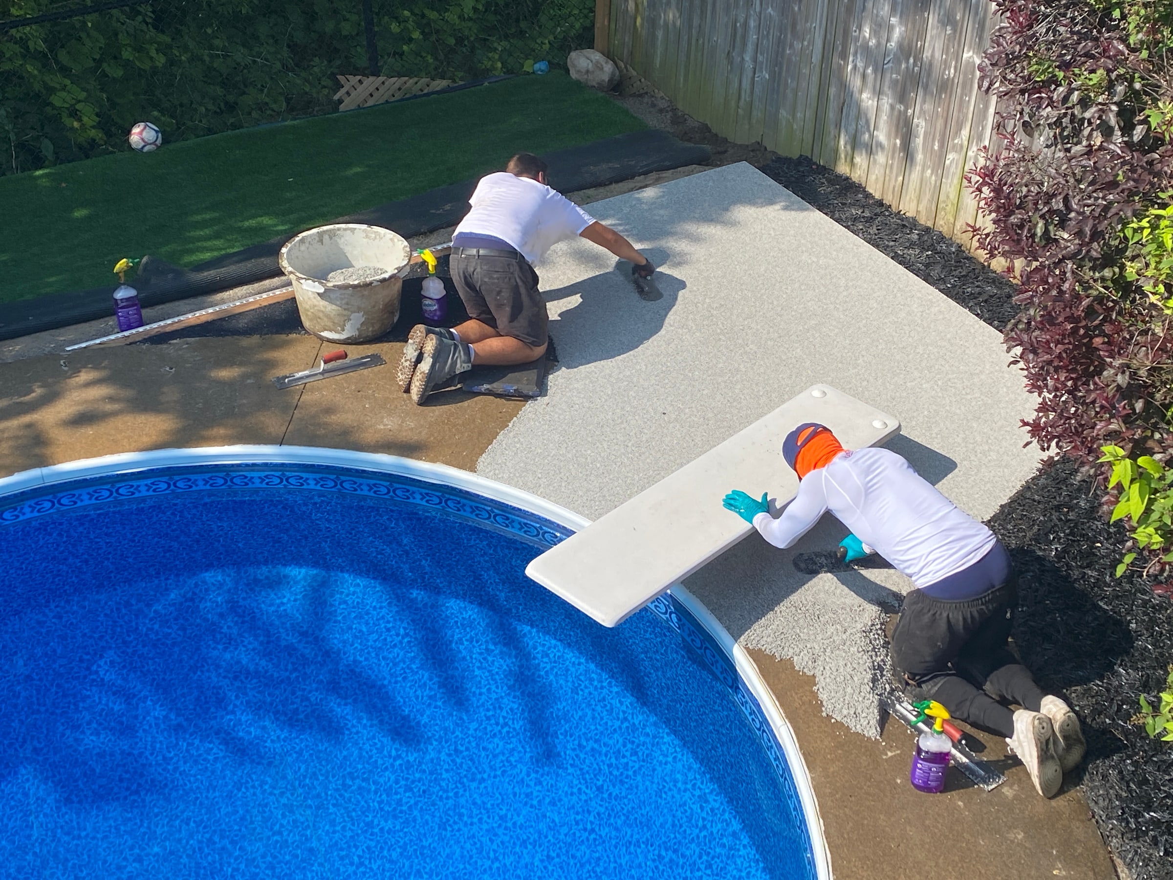 Pool deck rubber surfacing installation